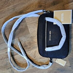 Michael Kors Jet Set Travel crossbody bag in black/silver. New with tags